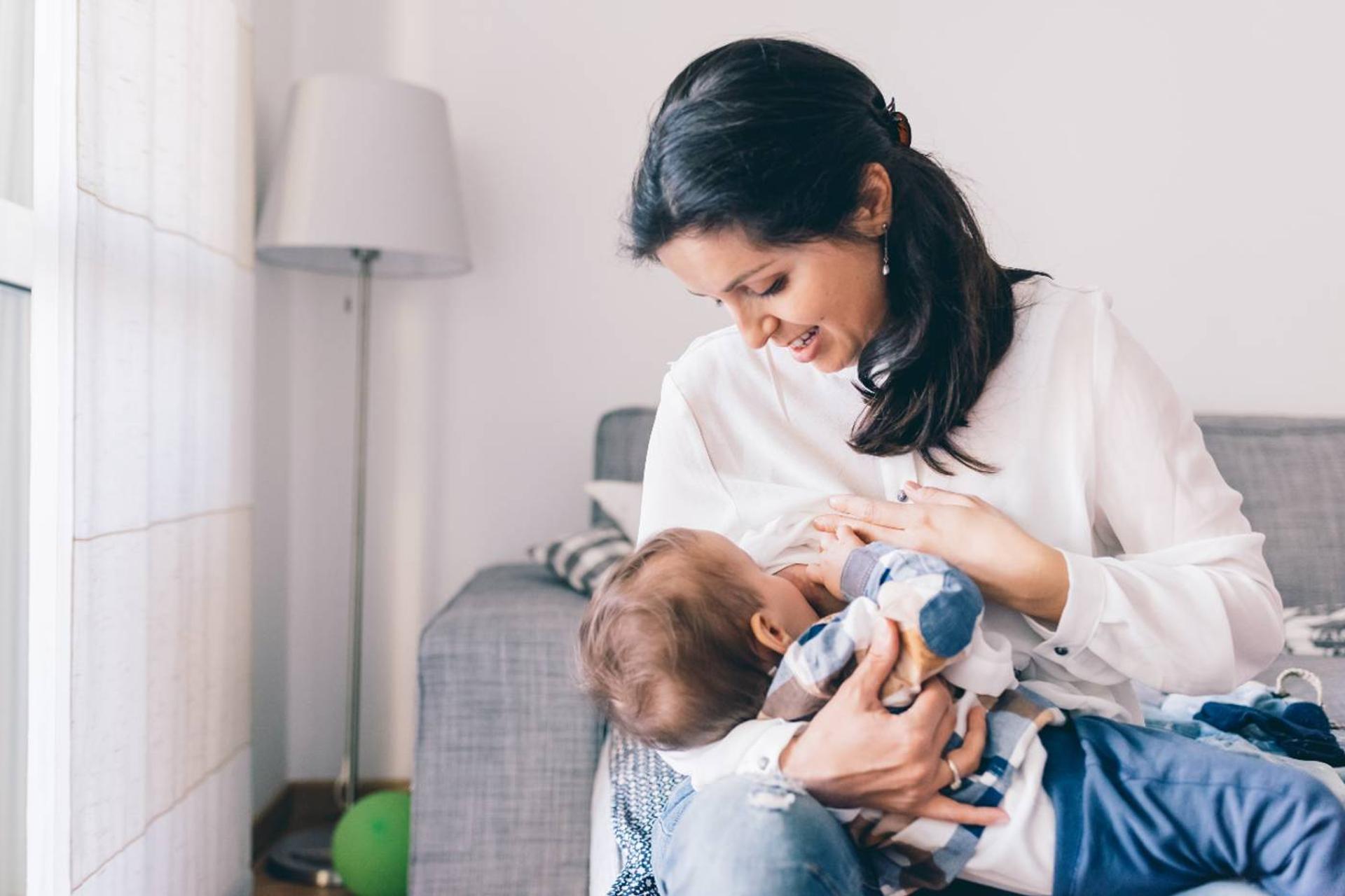mom breastfeeding baby