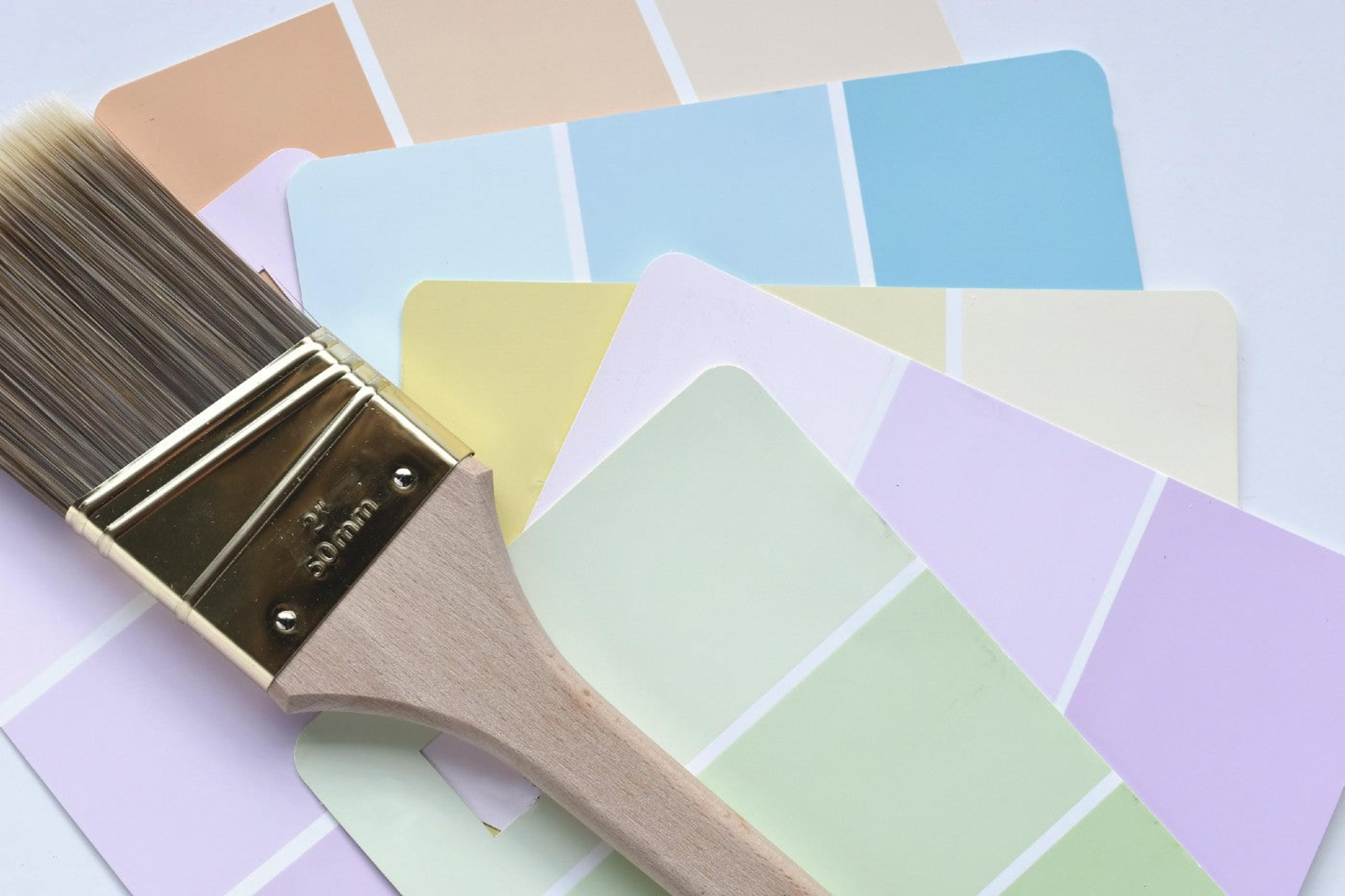 Light colored paint swatches for the nursery