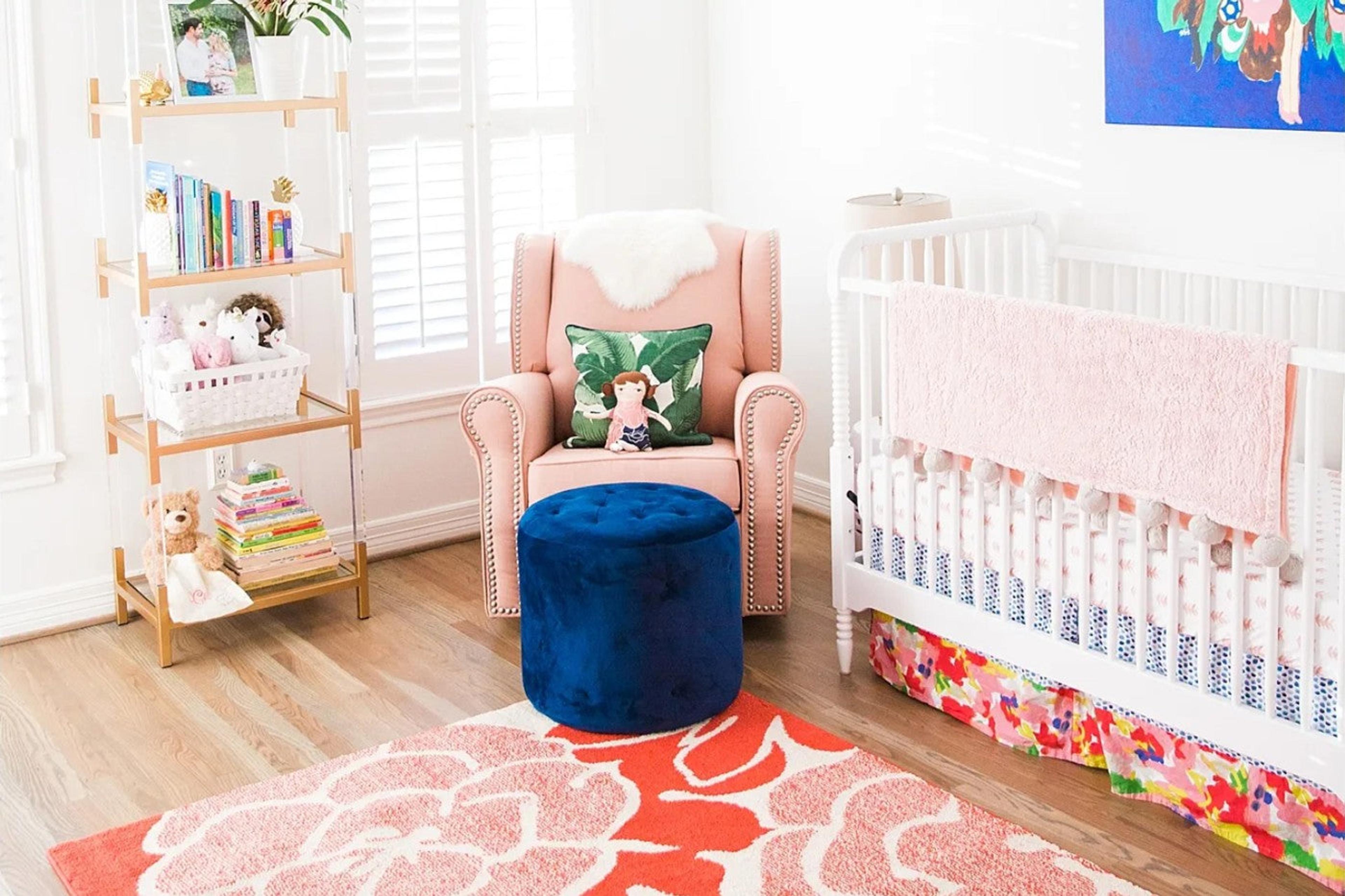 A pink, red, and blue nursery by snapshotsandmythoughts.com