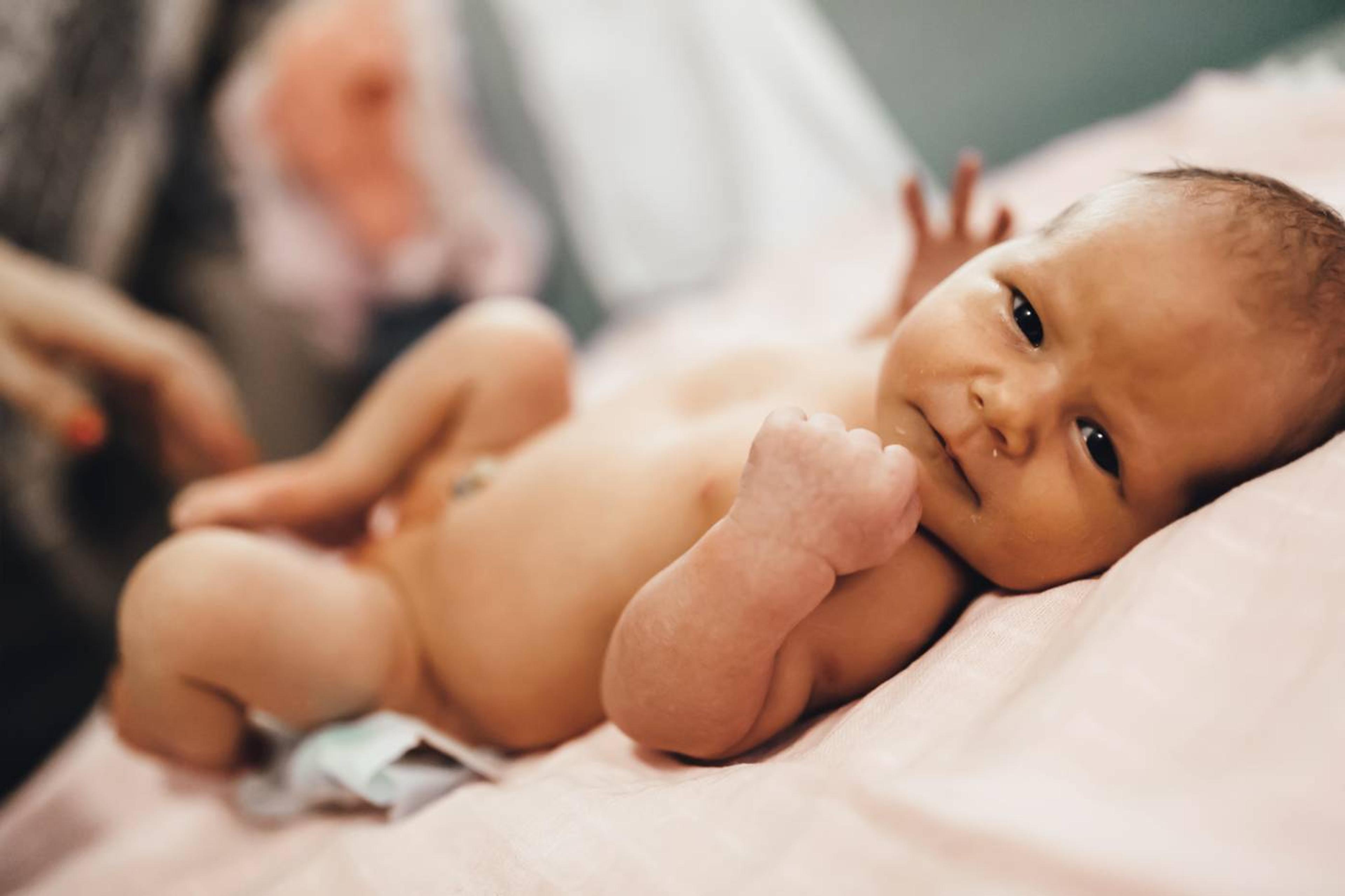 baby getting diaper changed: circumcision care