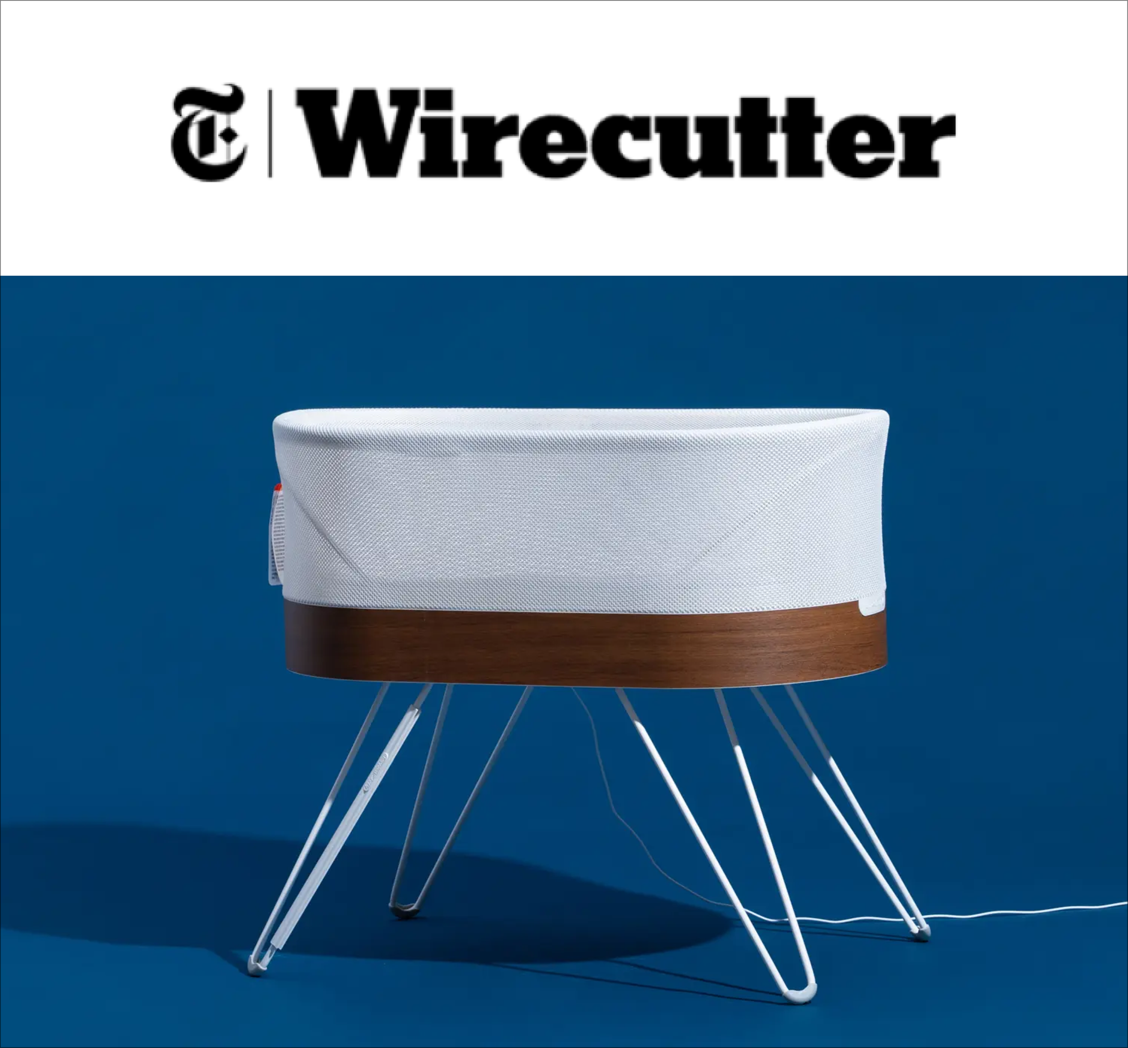 A magazine image featuring the SNOO bassinet