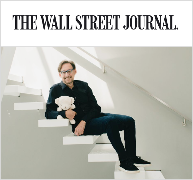 A magazine image of Dr. Harvey Karp, founder of the SNOO bassinet