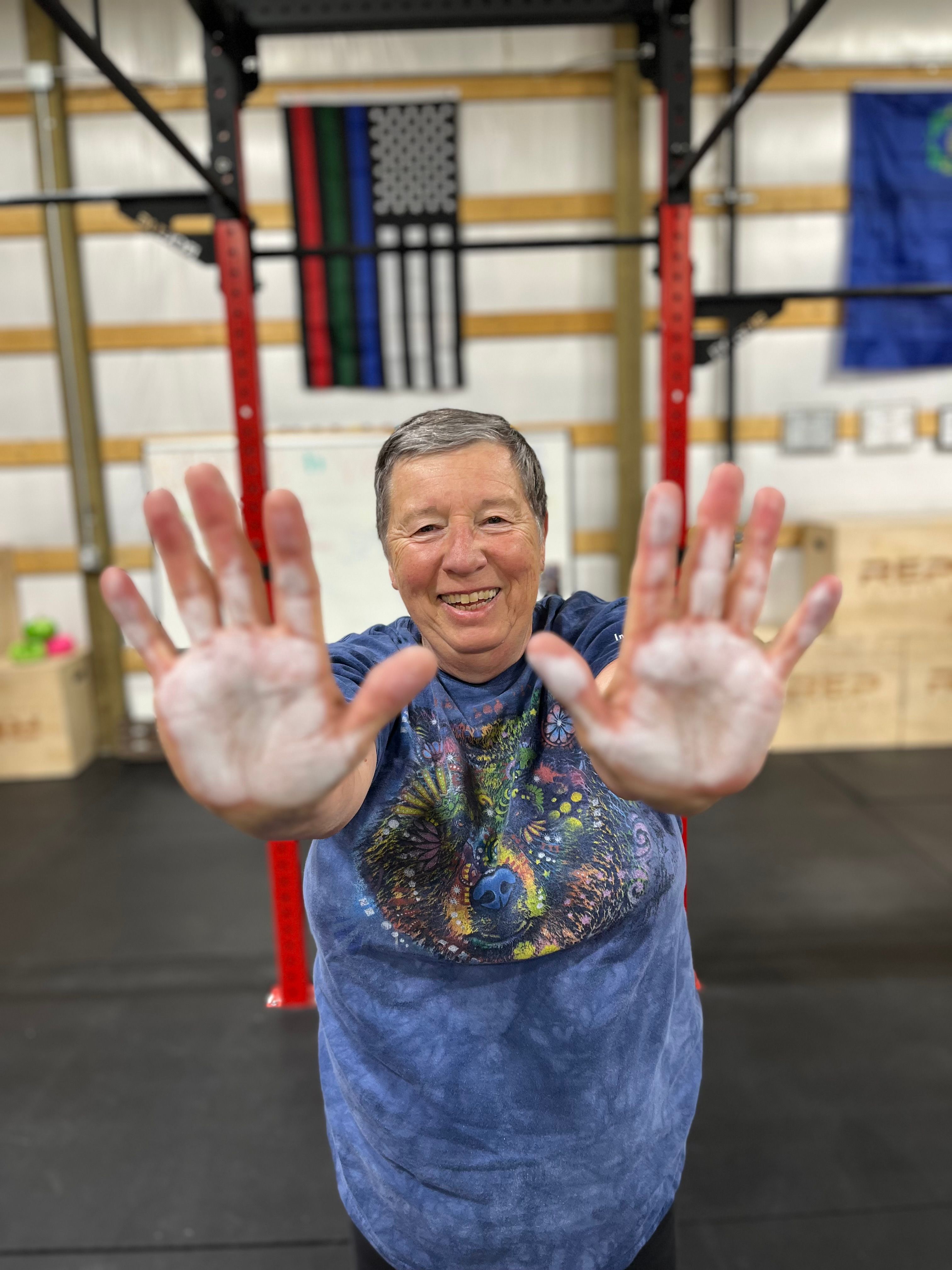 Coach Willee with hands out stretched