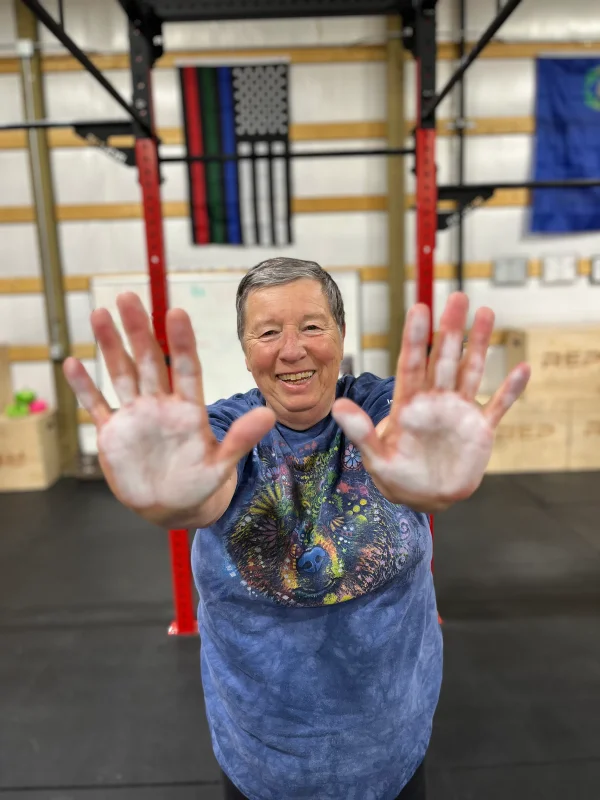 Coach Willee with hands out stretched