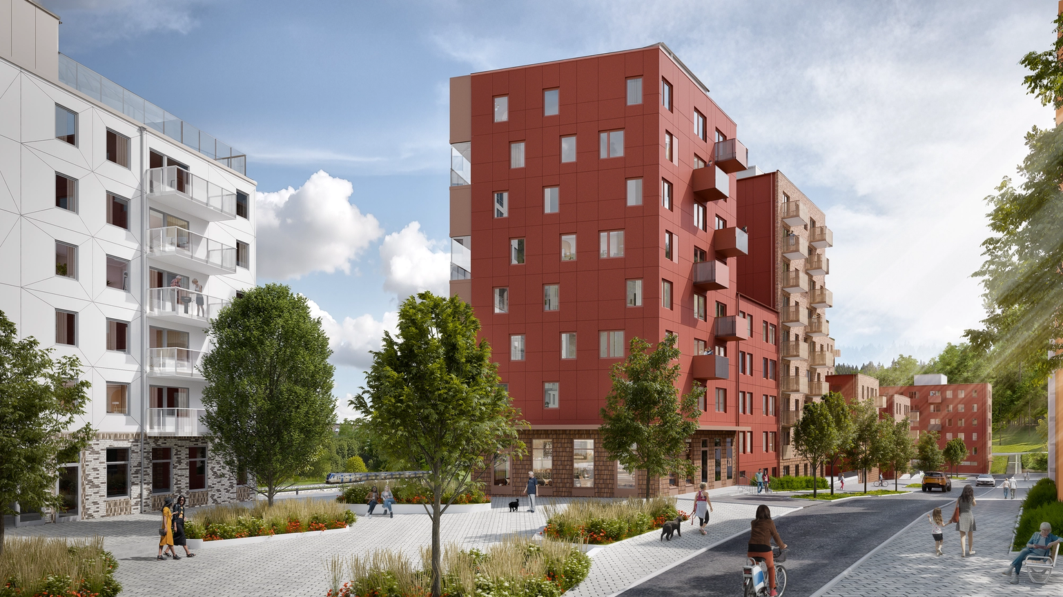 Two apartment buildings with a park and people walking in the park
