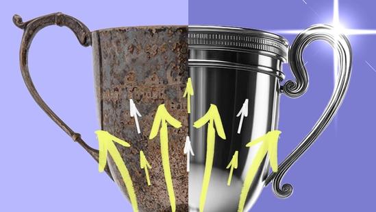 Arrows point upward on a trophy, half of which is shiny while the other half is tarnished.