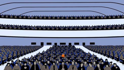 A figure in an orange shirt sits among many figures wearing dark clothes.