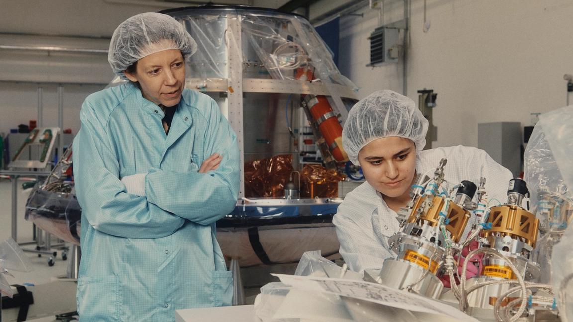 CEO Helene Huby in a rocket lab together with an colleague