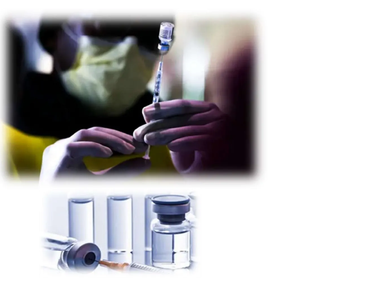 A person wearing a mask prepares a syringe with a vaccine vial.
