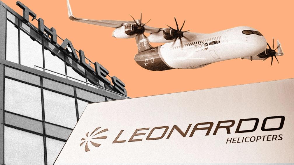 Airplane flying over Thales office building with a sign that reads Leonardo - Helicopters.