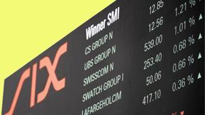 An image showing the SIX Swiss Stock exchange board and some listed firms with their percentage changes.