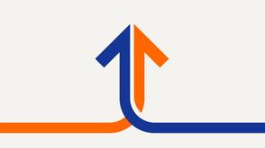 Two arrows, one blue, one orange, twist together as they point upwards.