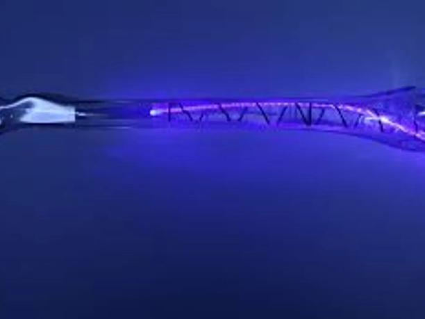 A glowing blue fiber optic cable with a twisted design.