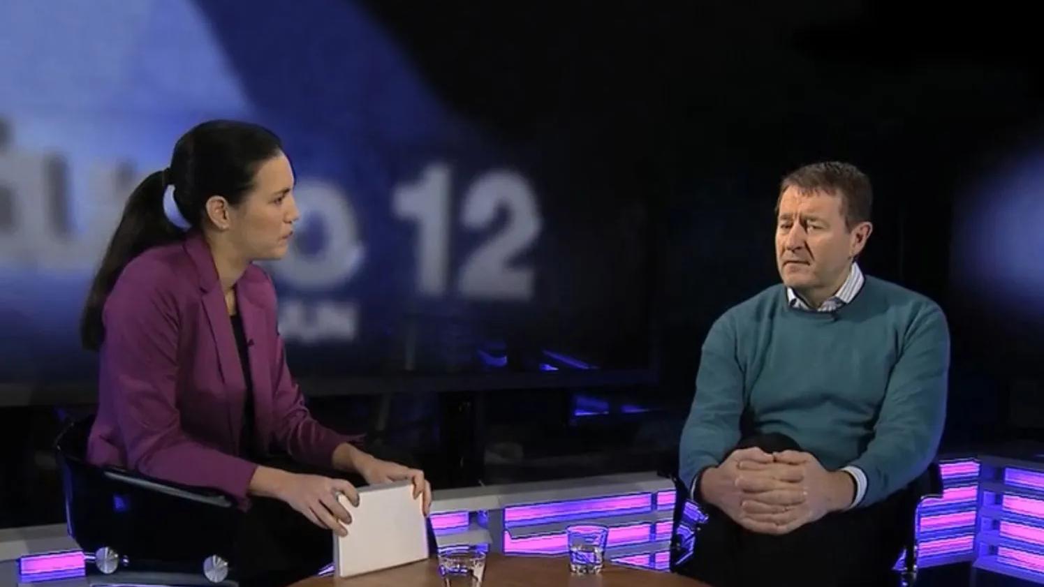 Picture of Conni Jonsson sitting in a interview.