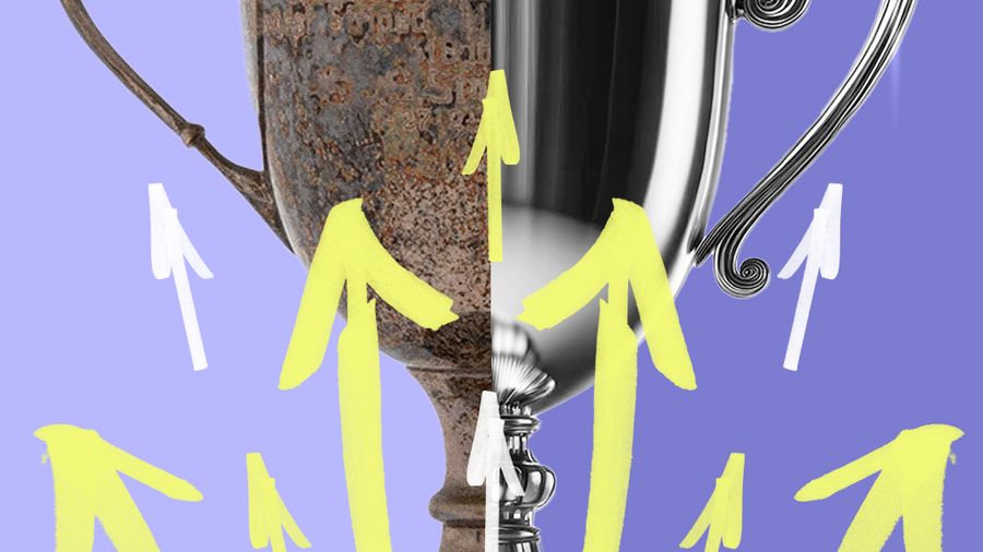 Arrows point upward on a trophy, half of which is shiny while the other half is tarnished.