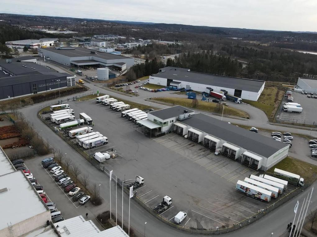 Aerial view of an industrial warehouse complex with multiple loading docks.