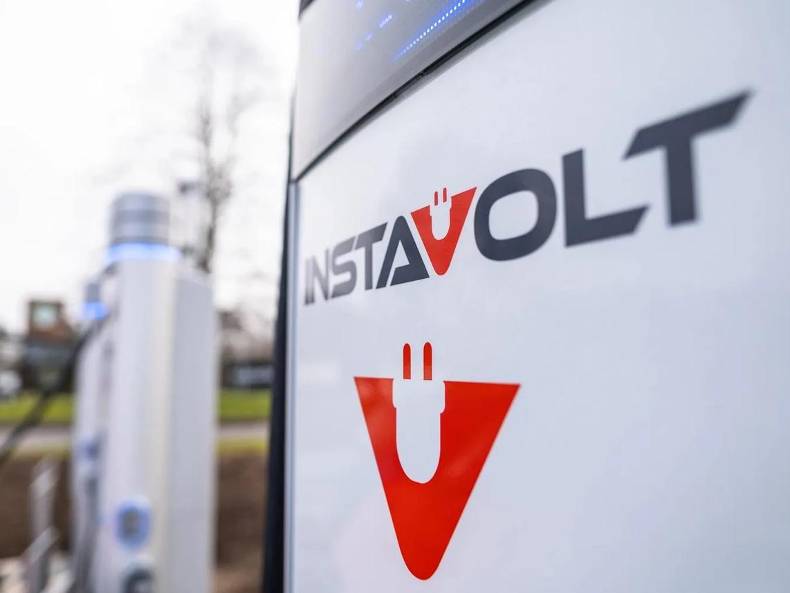 A close-up of an InstaVolt electric vehicle charging station.