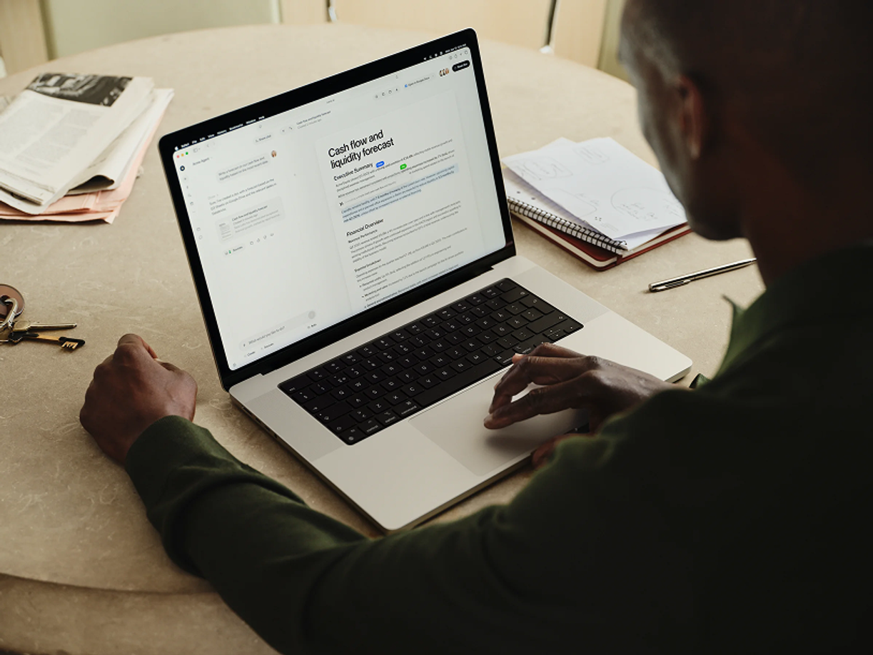 A man working on his computer in the Sana interface