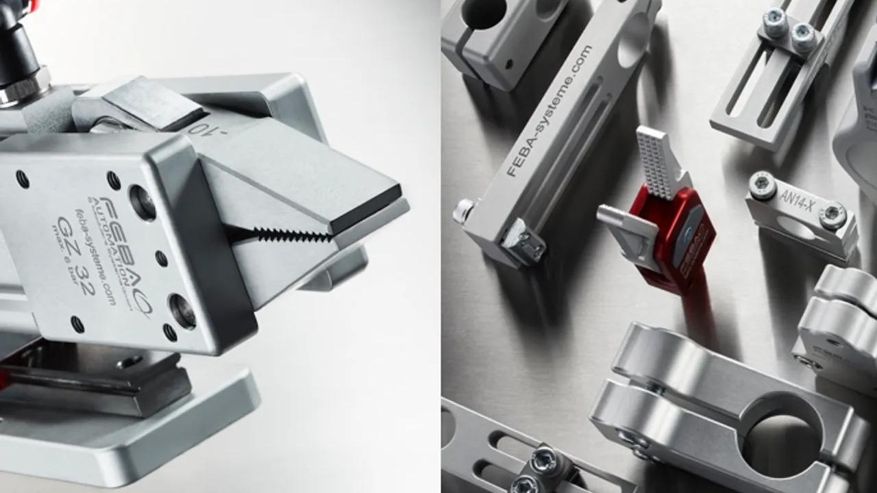 Close-up of industrial metal components and clamps with the brand "FEBA" visible on some parts.