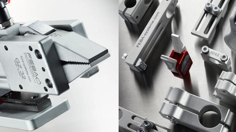 Close-up of industrial metal components and clamps with the brand "FEBA" visible on some parts.