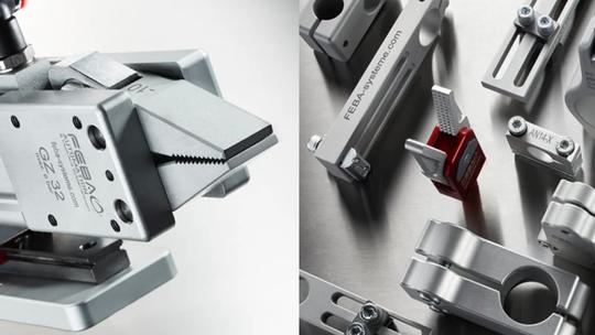 Close-up of industrial metal components and clamps with the brand "FEBA" visible on some parts.