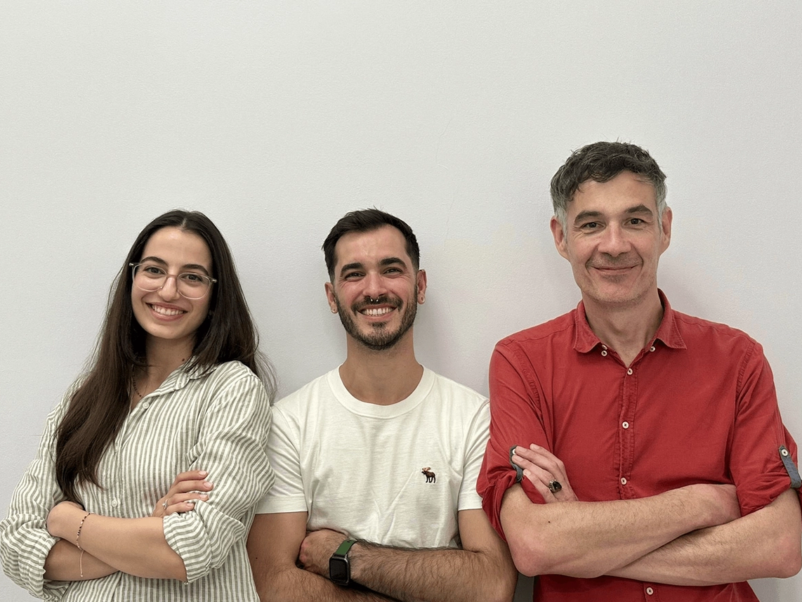 Image of three people smiling