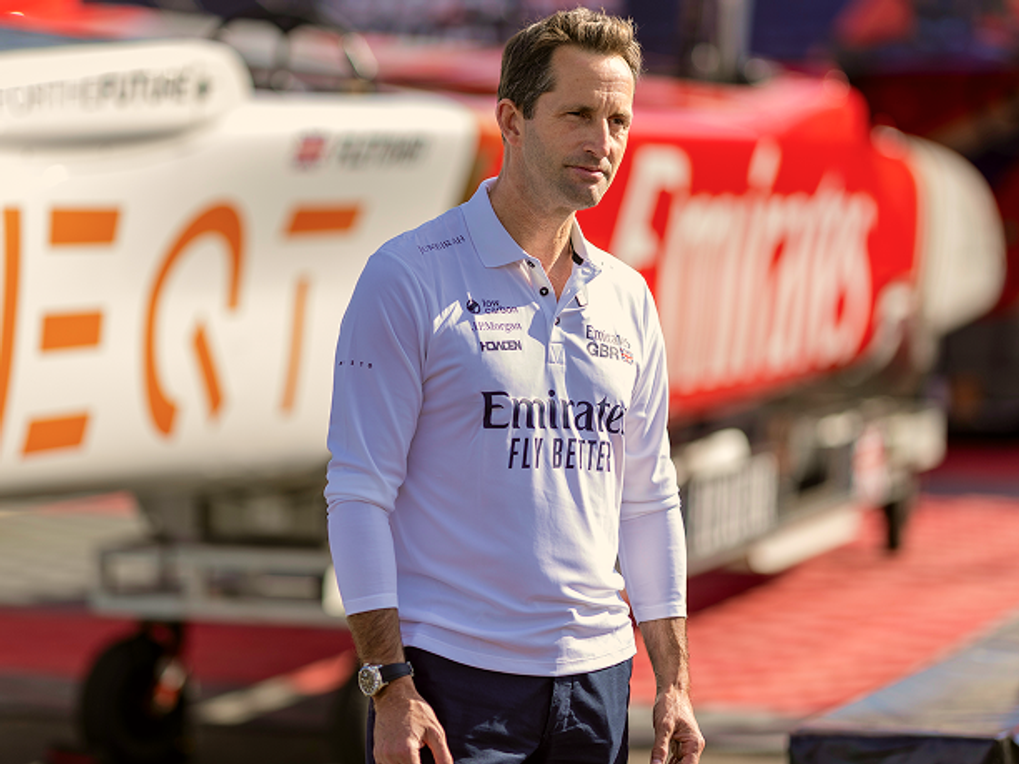 James Vowles, Team Principal of the Williams F1 Team, wearing a white team-branded polo shirt in front of the EQT logo.