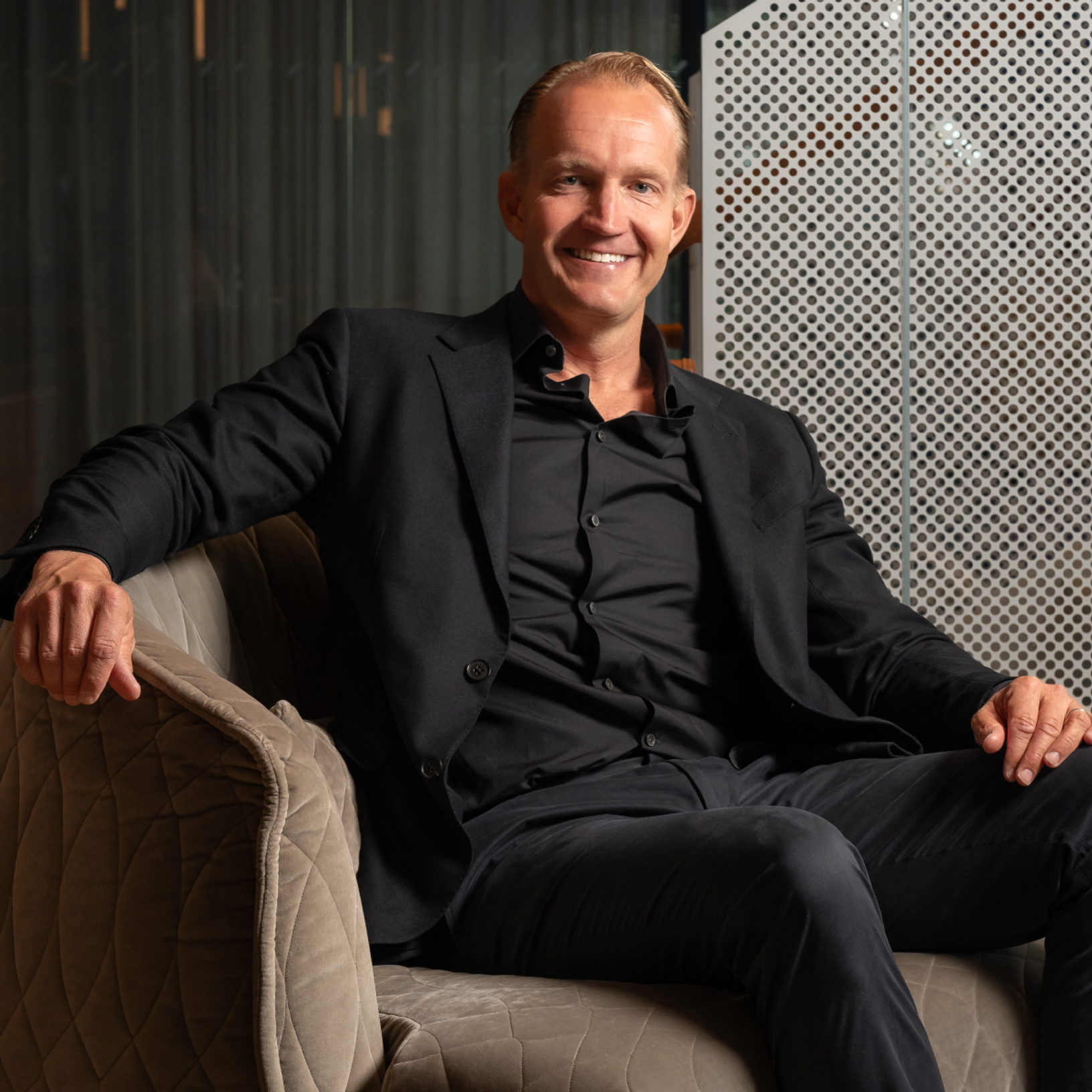 Per Franzén sitting on a couch
