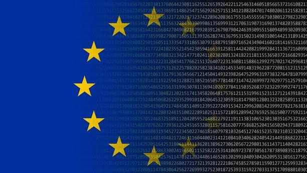 European Union flag with yellow stars mixed with computer text.