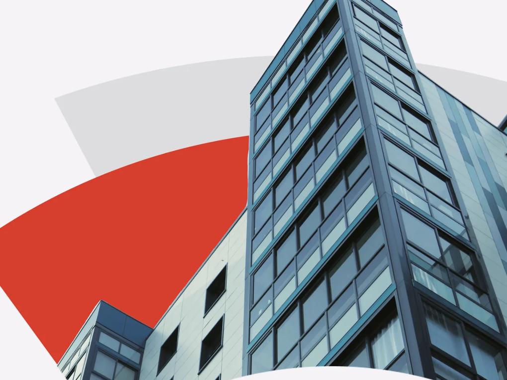 A modern glass office building with a geometric design, set against a background featuring abstract red and gray shapes.