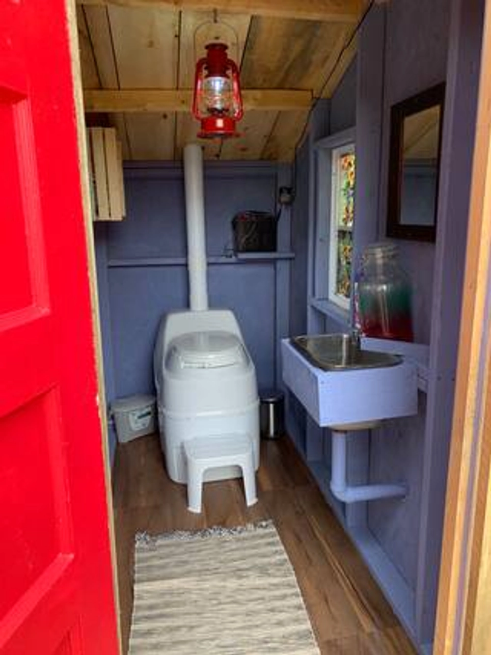 Solar powered composting toilet