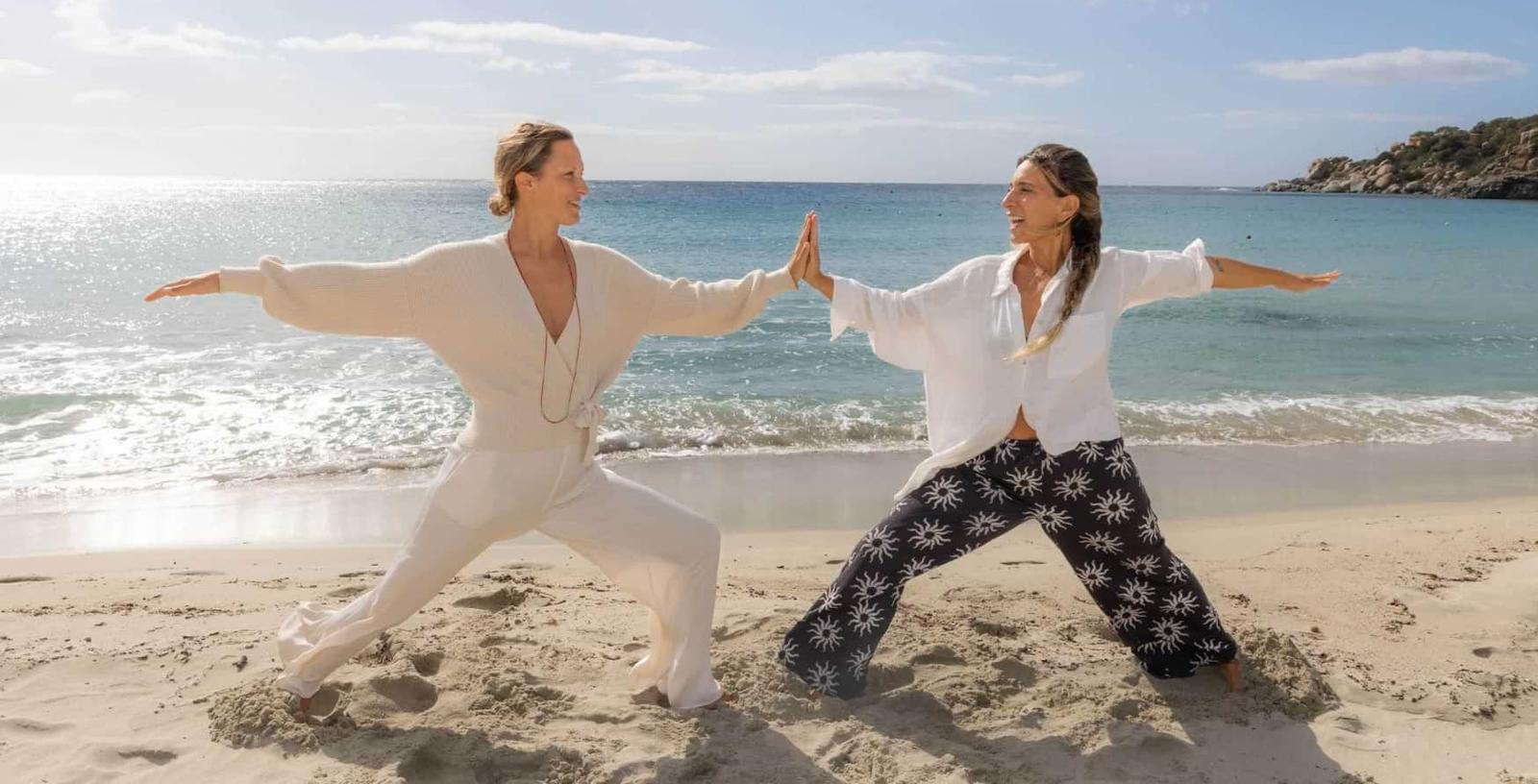Retreat hosts Emilie and Fernanda on the beach in Sardinia