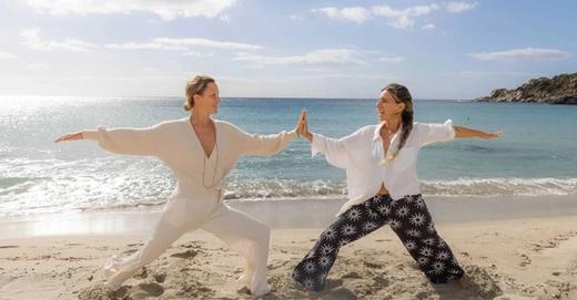 Retreat hosts Emilie and Fernanda on the beach in Sardinia