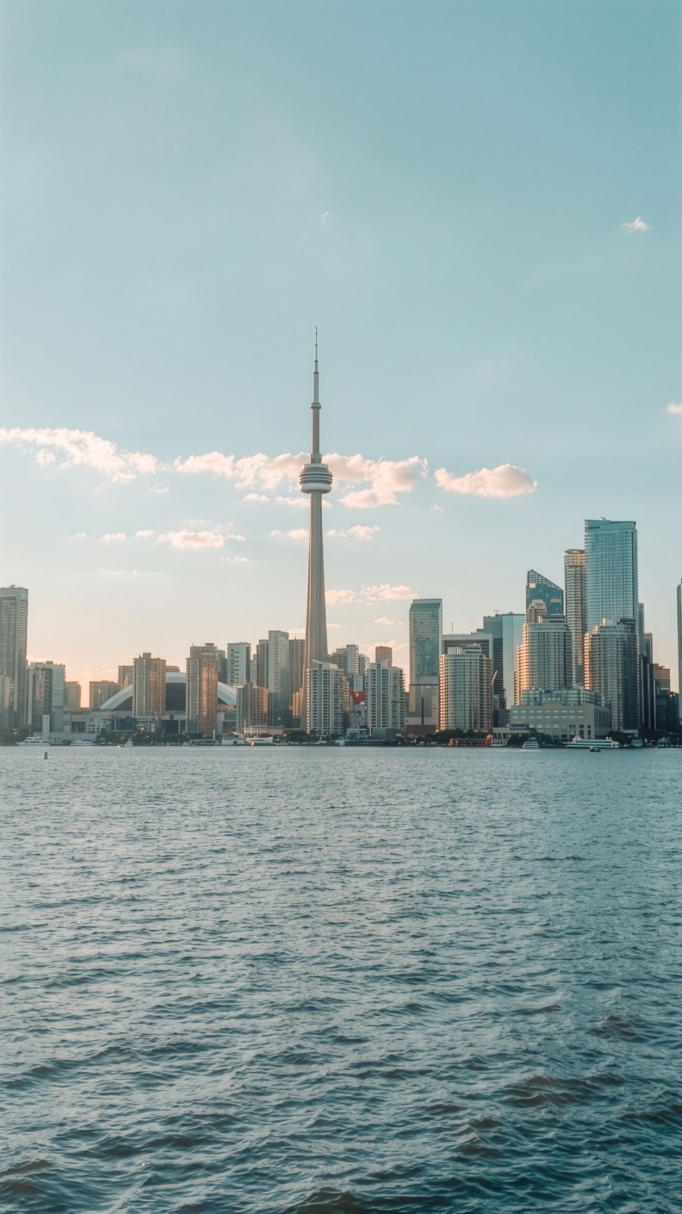 Toronto skyline with the CN Tower photographed by House of Singh from across the waterfront.