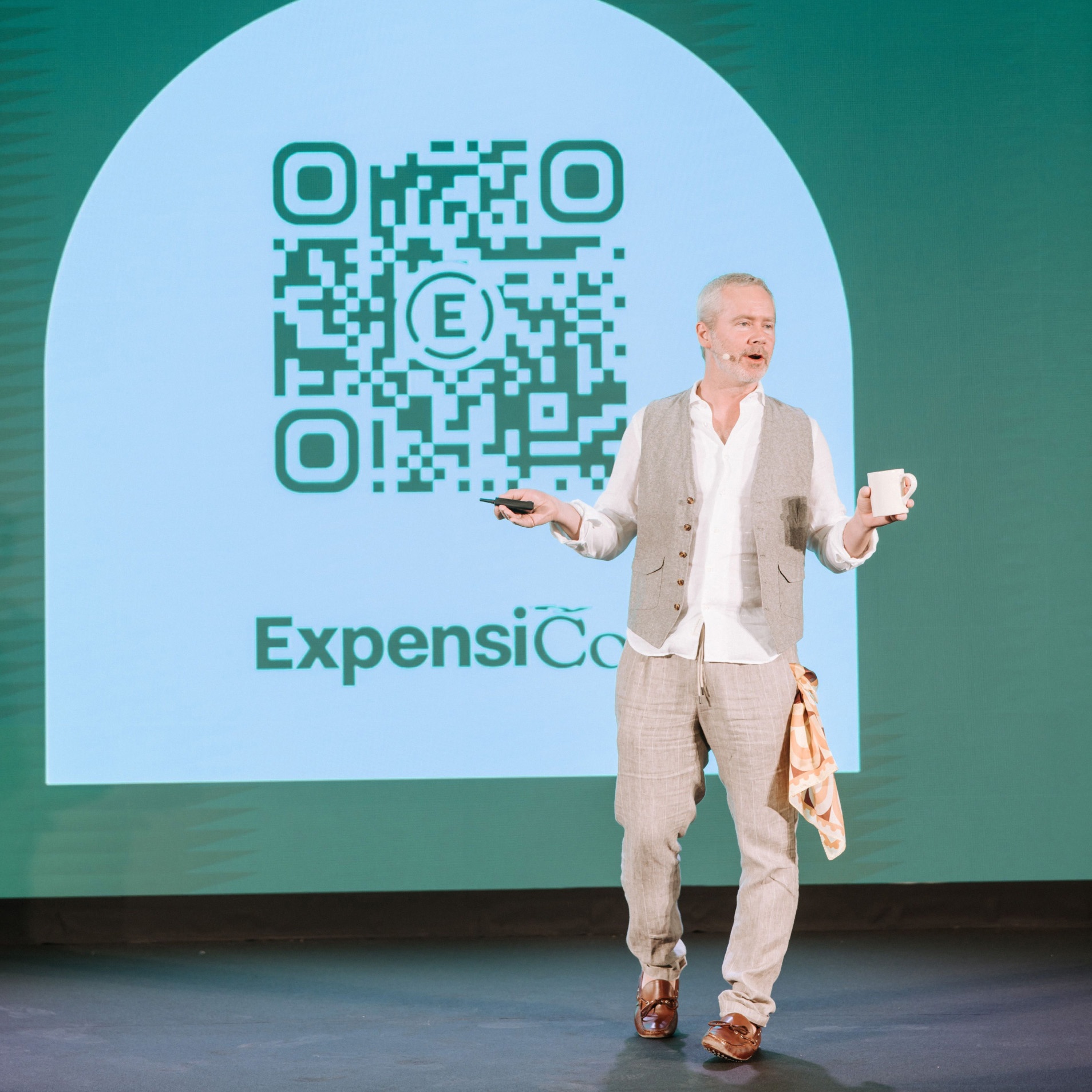 David Barrett on stage at Expensicon