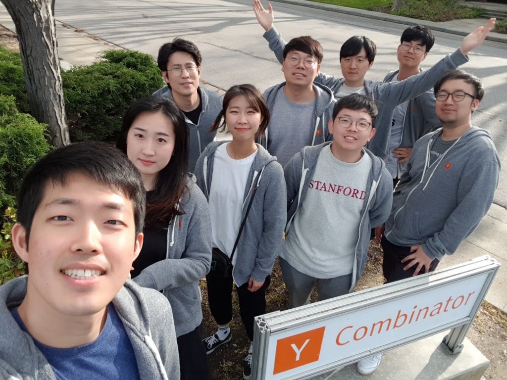 Our team in front of YC sign