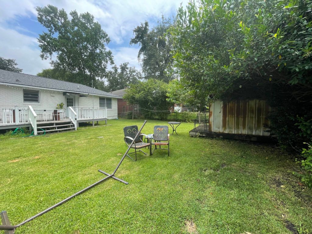 A Mid Century Ranch Backyard in Charleston Before Landscape Design