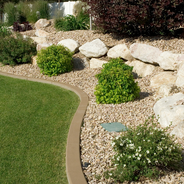 year round interest front garden that's low maintenance with rocks and shrubs