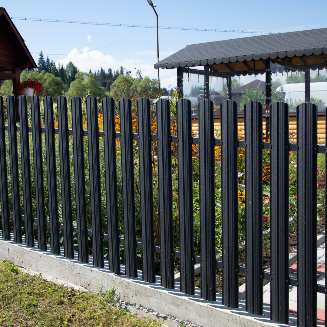 aluminum fencing around a garden