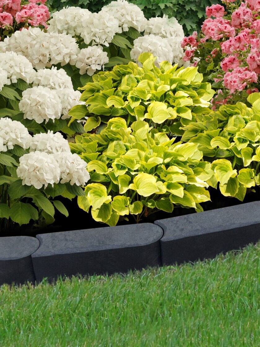 recycled rubber around flower beds for curb appeal 
