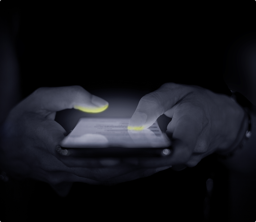 Hands using a smartphone to illustrate game-based learning for HCPs