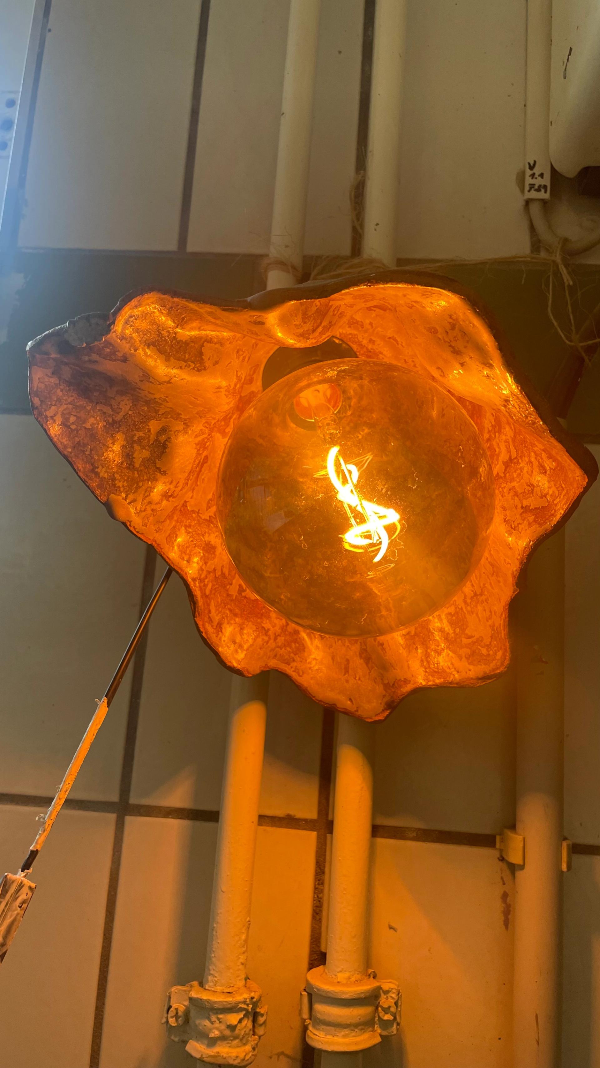 Ceramic lamp from below showing glowing interior