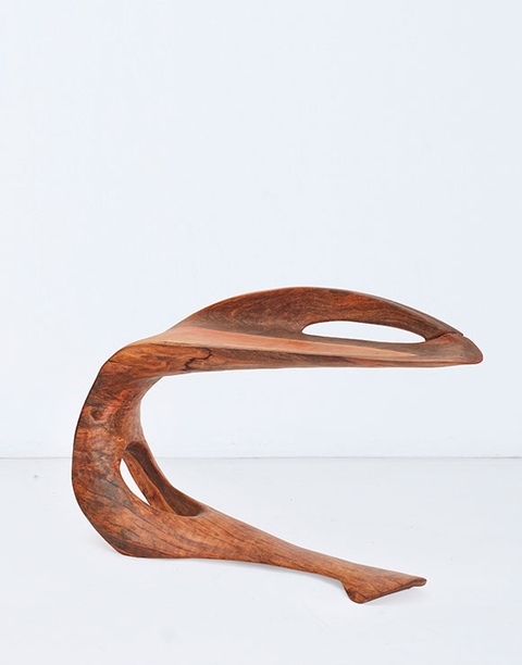 Adam Birch transforms fallen trees into extensive collection of furniture for Xigera