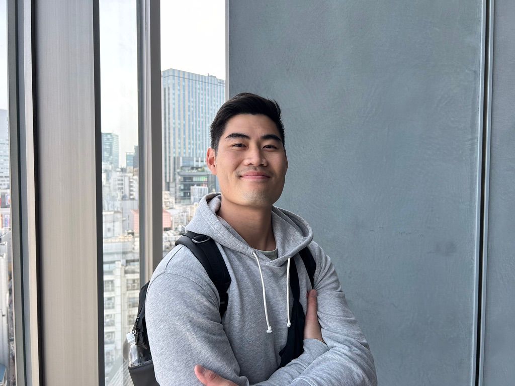 Adam Ng in a city high-rise