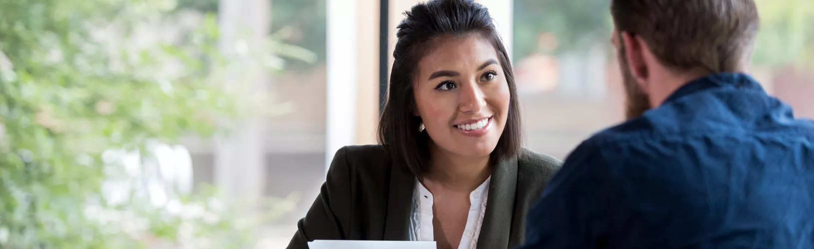 Man and woman discuss optimizing audit efficiency