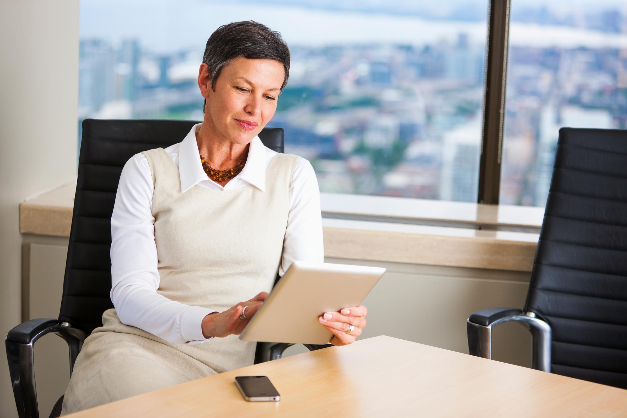 Board member reviews the best practices for board of directors' self assessments