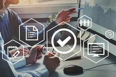 Woman selects data from computer in backdrop. Illustration on top of photo illustrating subsidiary governance symbols.