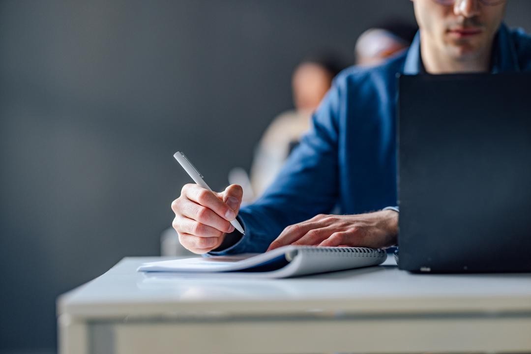 A company secretary preparing the corporate records of a business