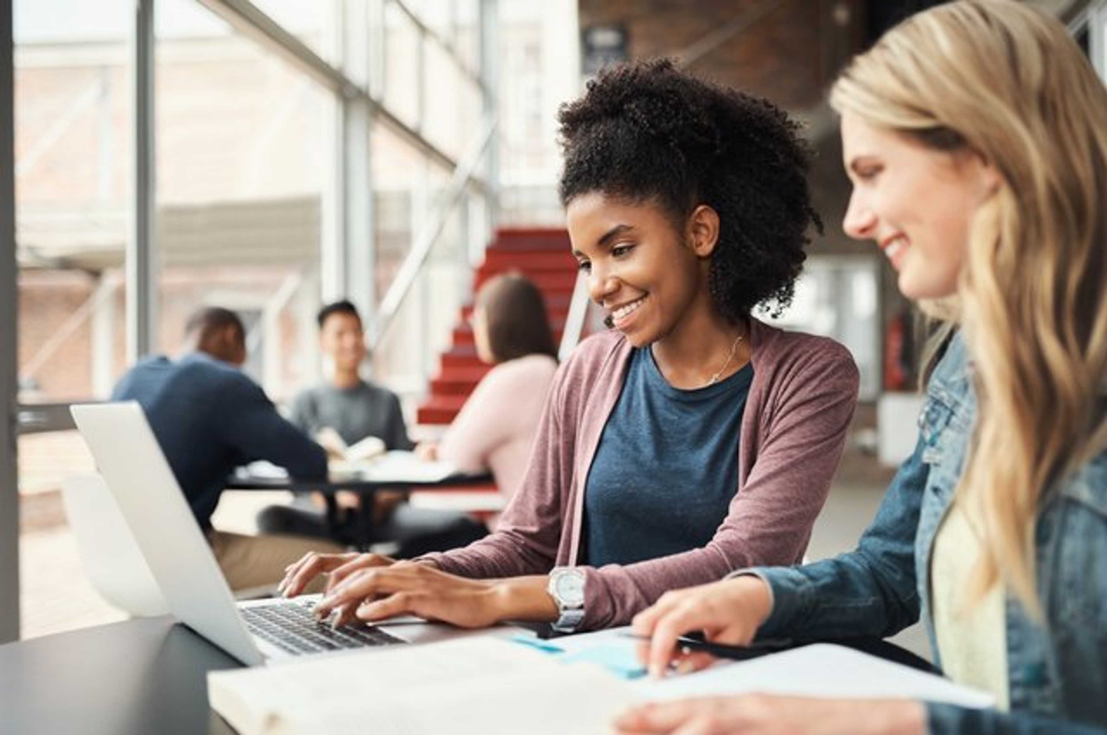 Board members using Diligent AI to make board pack creation easier