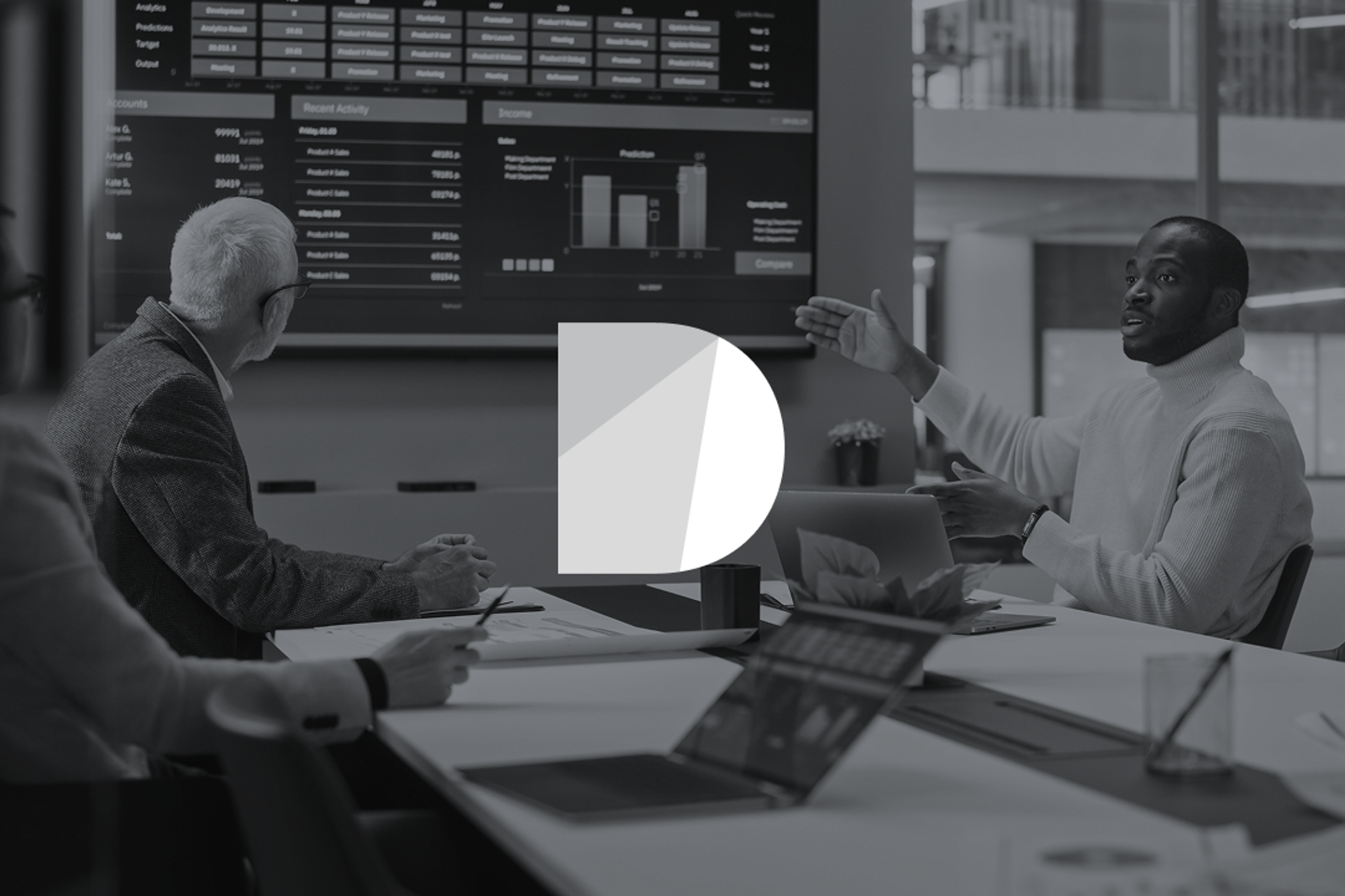 Modern office conference room with conversations occuring